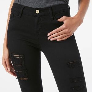 FRAME Mid-Rise Skinny Leg Jeans